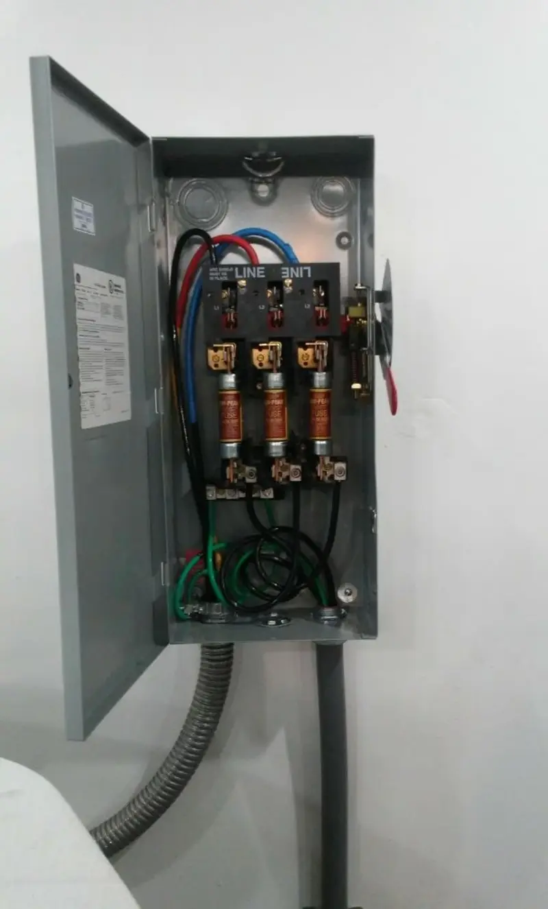 Three-phase disconnect switch installed for Smoke Detector Installation in Lakewood